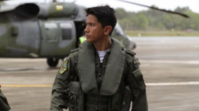 6 The dashing portrait of Prince Abdul Mateen in military uniform, piloting a fighter plane is in the spotlight